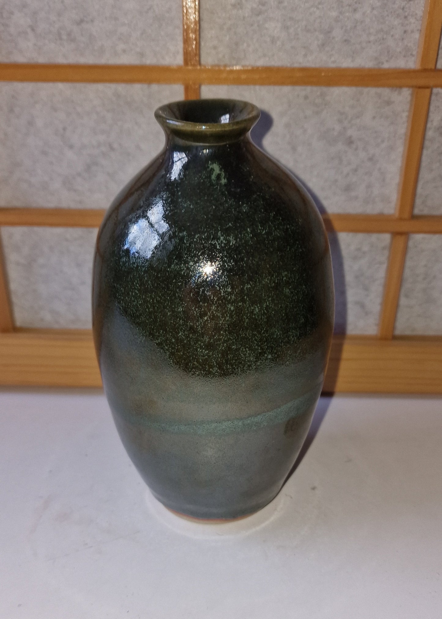 Dark green vase